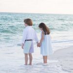 children watching the ocean waves in Destin Florida