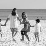 black and white photo of family at the beach in Destin Florida